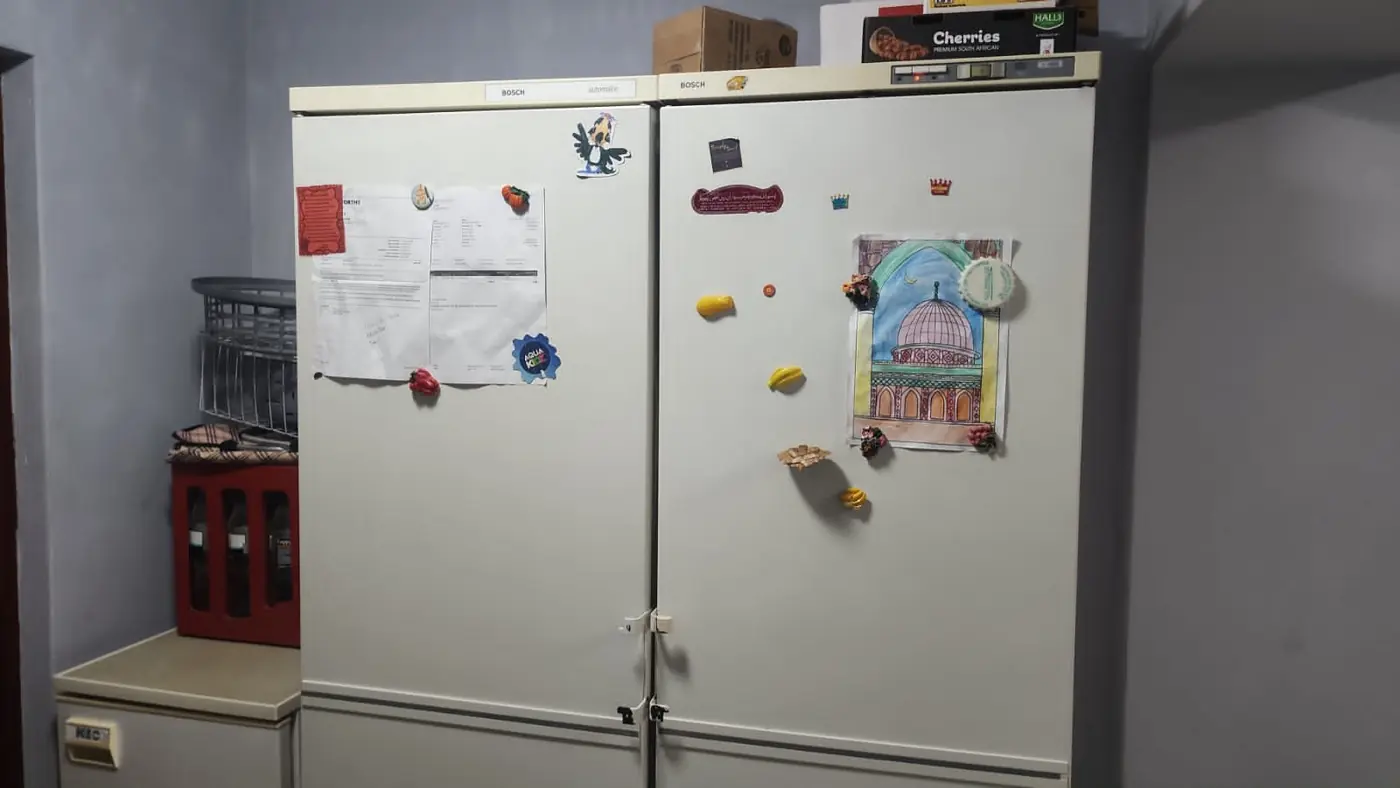 Domestic double-door fridge assessed in a Johannesburg home