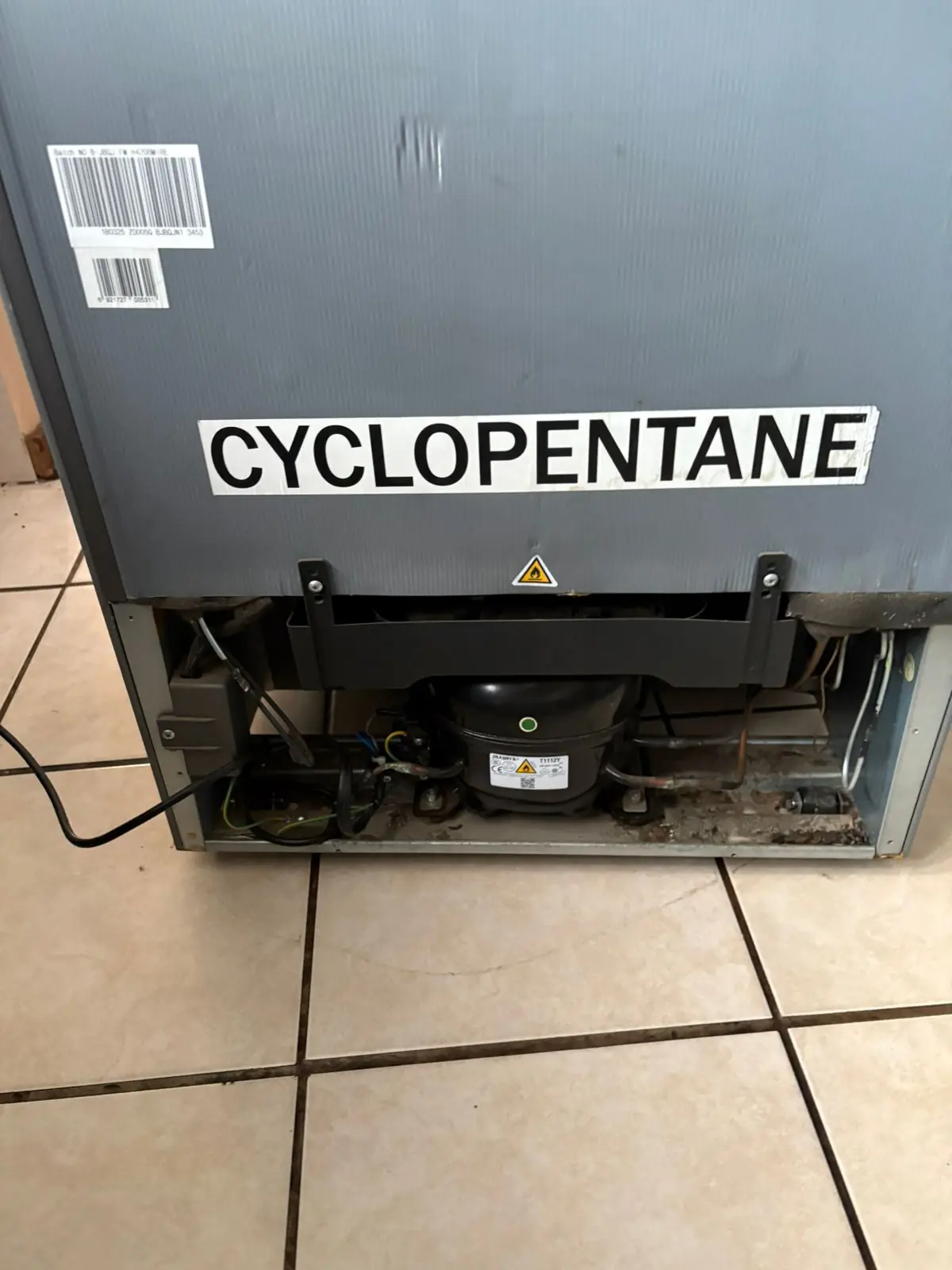 Rear access opened for compressor and cooling-system diagnosis